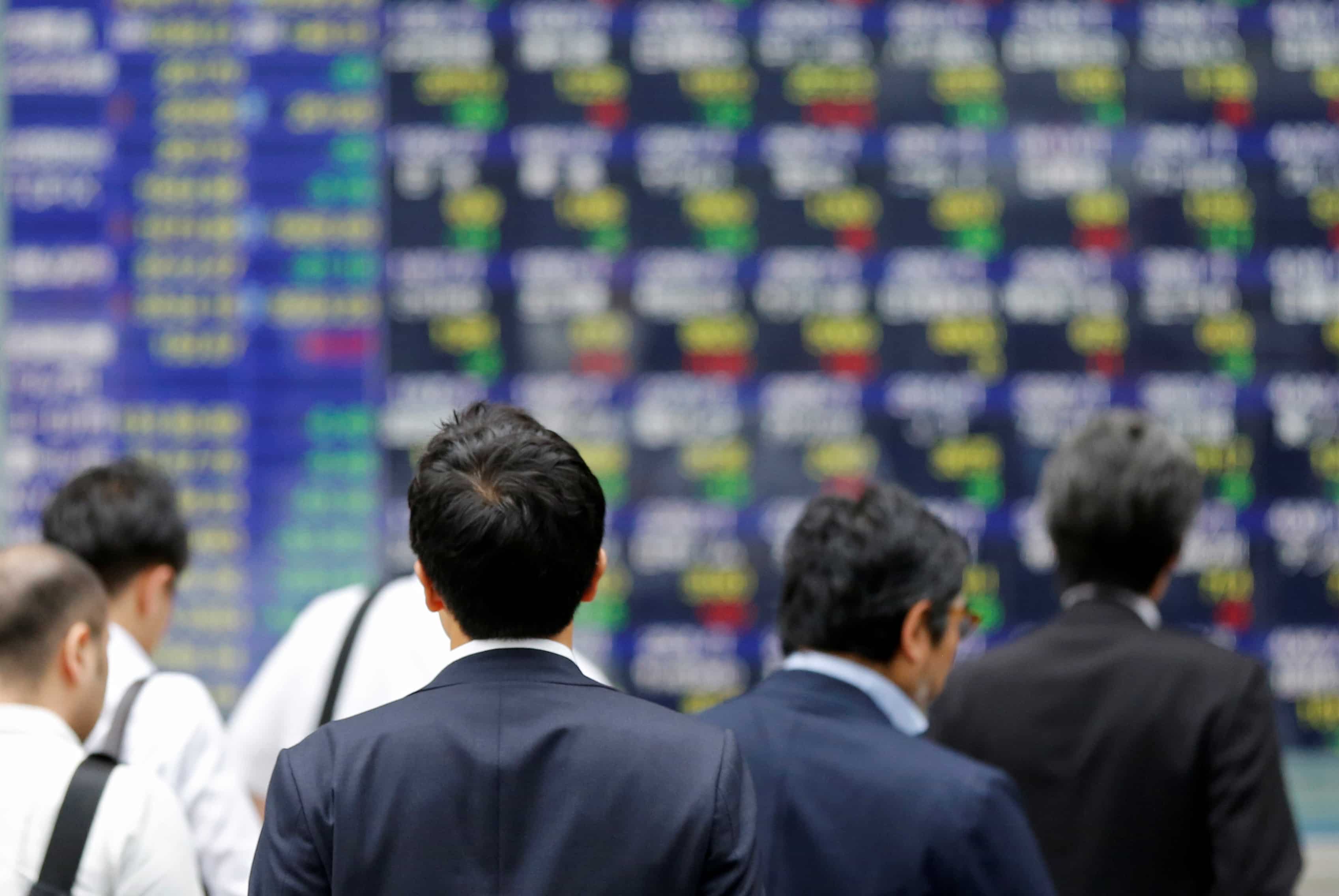 Asian shares face headwinds from fresh trade worries, bonds fragile