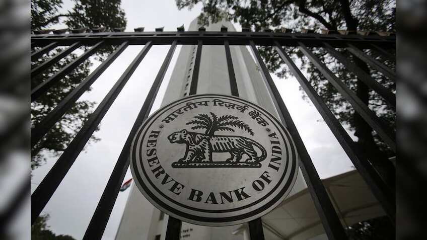 Analysis: India chooses between a falling rupee and a banking cash crunch