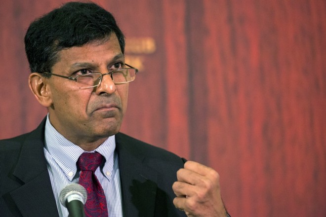 Raghuram Rajan says rupee needs modest weakening after