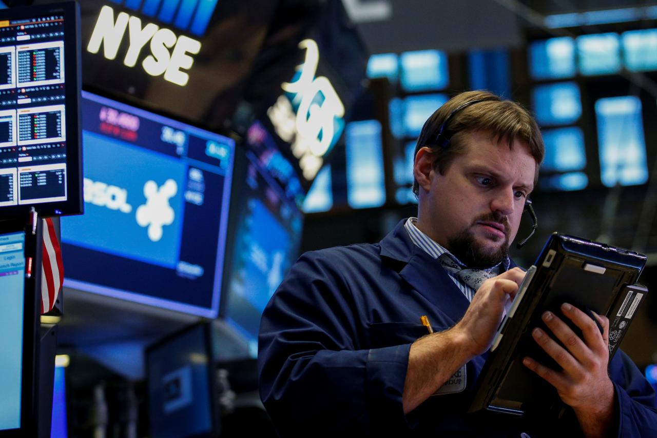 Global Markets: Asian shares trim losses on renewed
