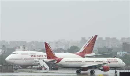 Heavy rain hits Delhi airport, delays over 100 flights