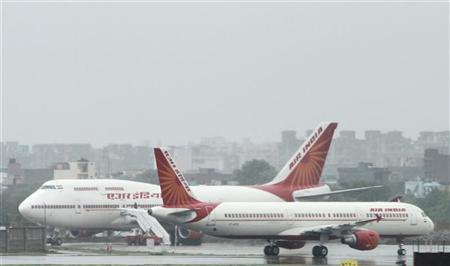 Heavy rain hits Delhi airport, delays over 100 flights
