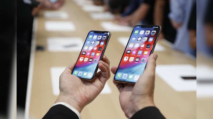 Apple iPhones get bigger and pricier, Watch turns to health