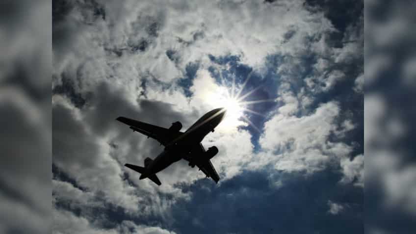 Flyers alert! Aviation disaster averted; this man tried to open plane's door in mid-air!