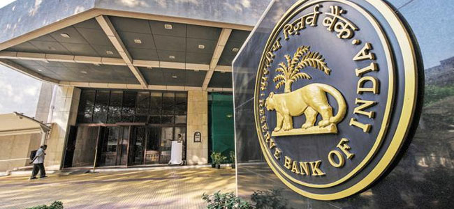 Rupee set to force RBI to raise key rates next week: Poll