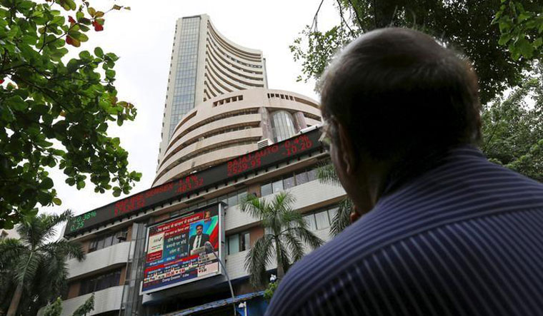 Nifty, Sensex edge lower as new import tariffs set in; financials drag