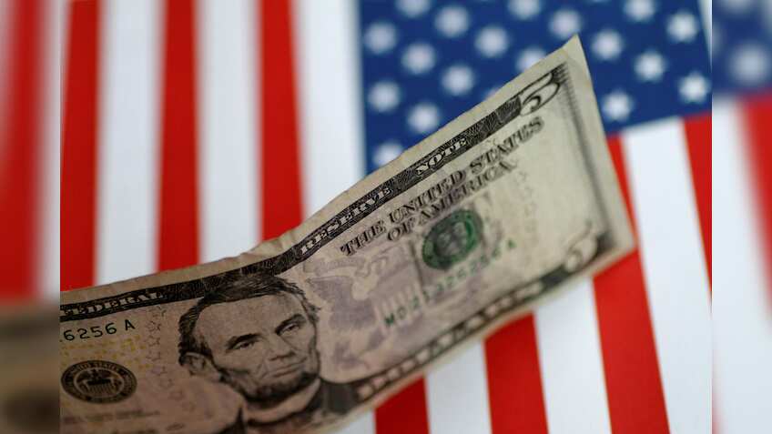 Strong U.S. economy buoys dollar, puts Asian currencies on skids: Reuters poll