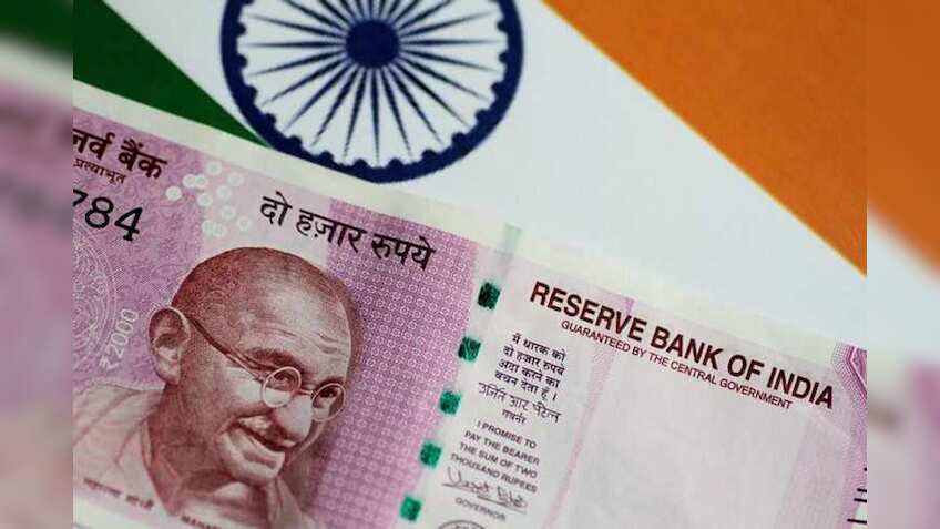Indian Rupee rises from record low, recovers 23 paise against US dollar