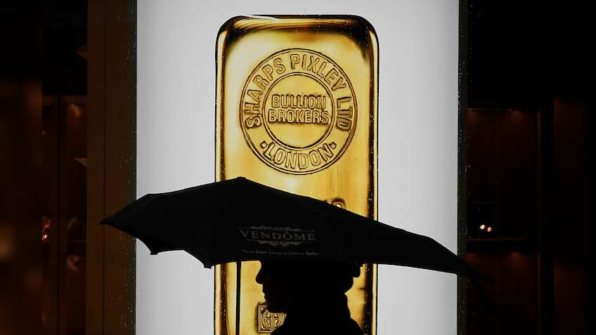 Gold near highest in over two months as equity plunge boosts safe-haven appeal