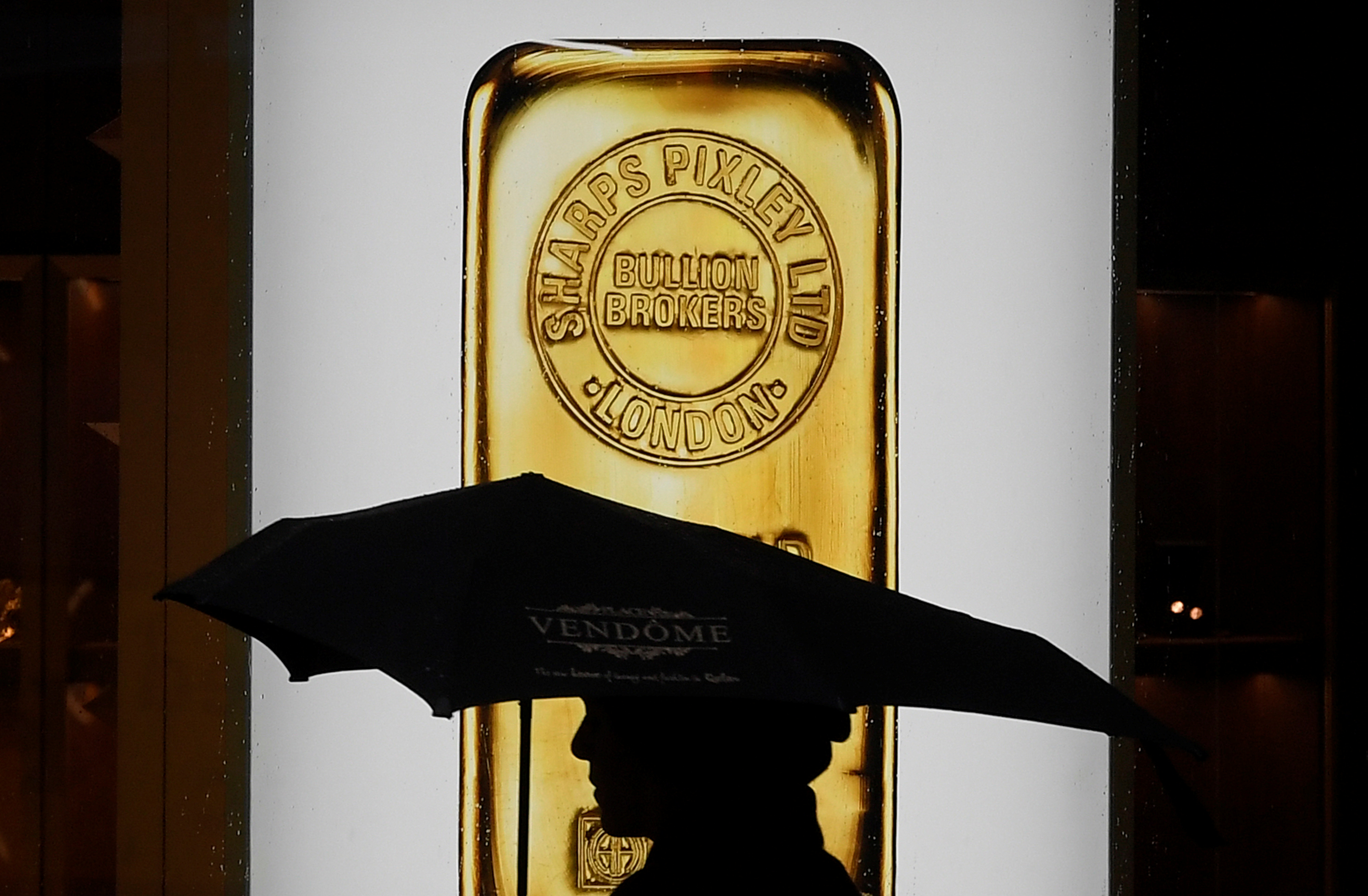 Gold near highest in over two months as equity plunge boosts safe-haven appeal