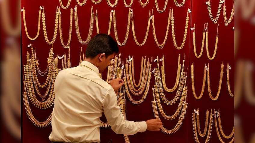 Gold remains higher on global cues, festive demand