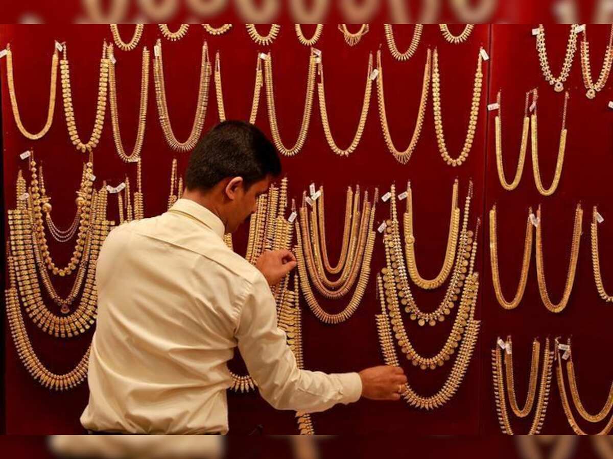 Gold remains higher on global cues, festive demand