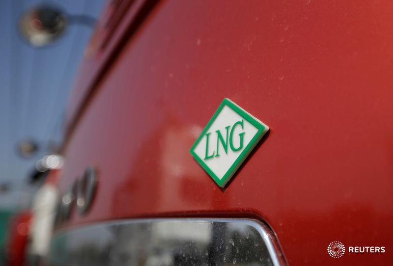 Total in talks to buy stake in Adani's LNG, city gas projects
