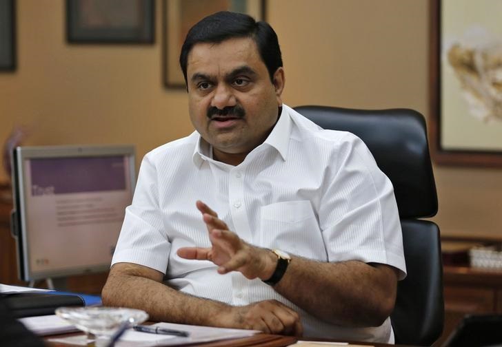 Adani, Total join hands to set up retail network, LNG terminal