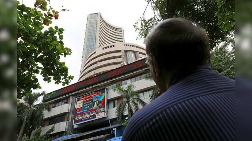 Global cues, rupee dent equity indices; Sensex down over 400 points