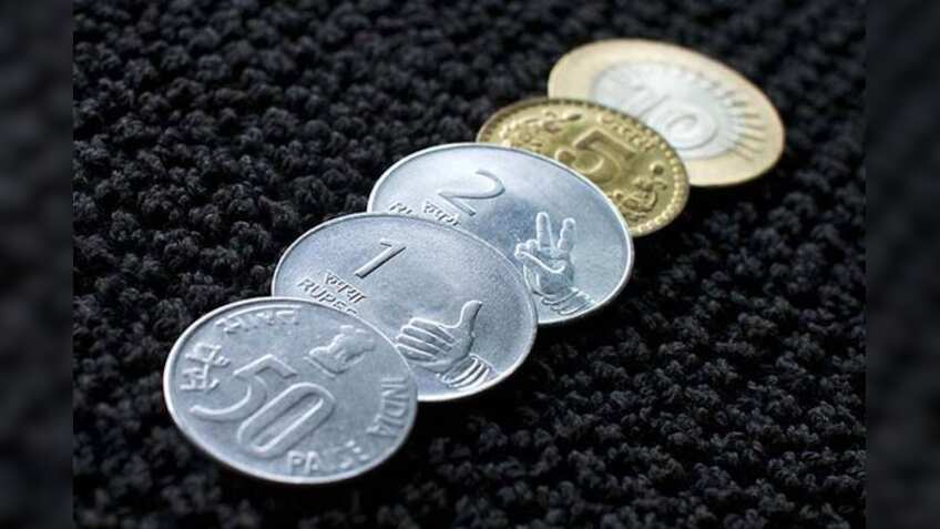 Indian rupee may trade at 69.79 in H2 if RBI mops up $30 bn from NRIs