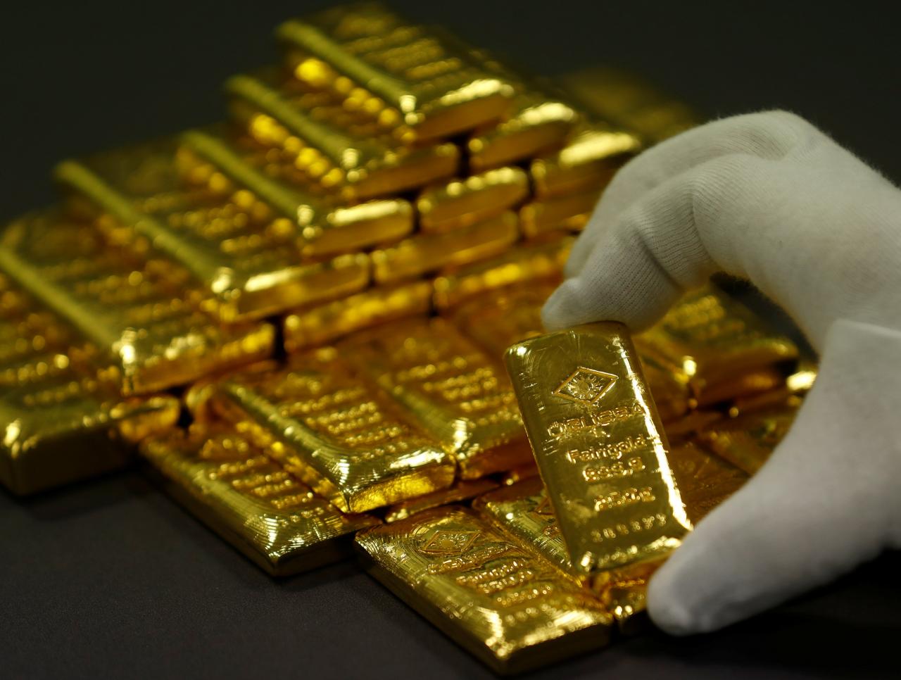 Gold firm as dollar dips after U.S. election