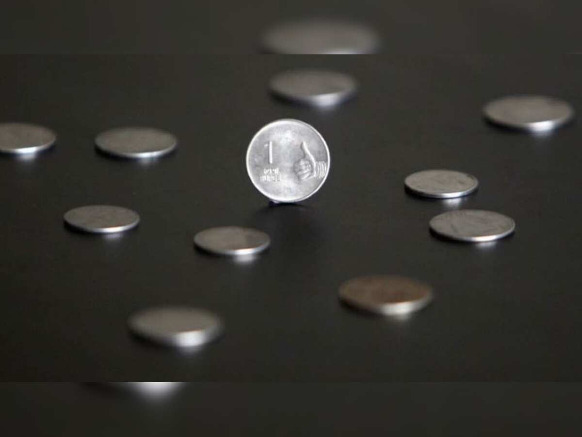 More trouble ahead for bruised Indian rupee: Poll