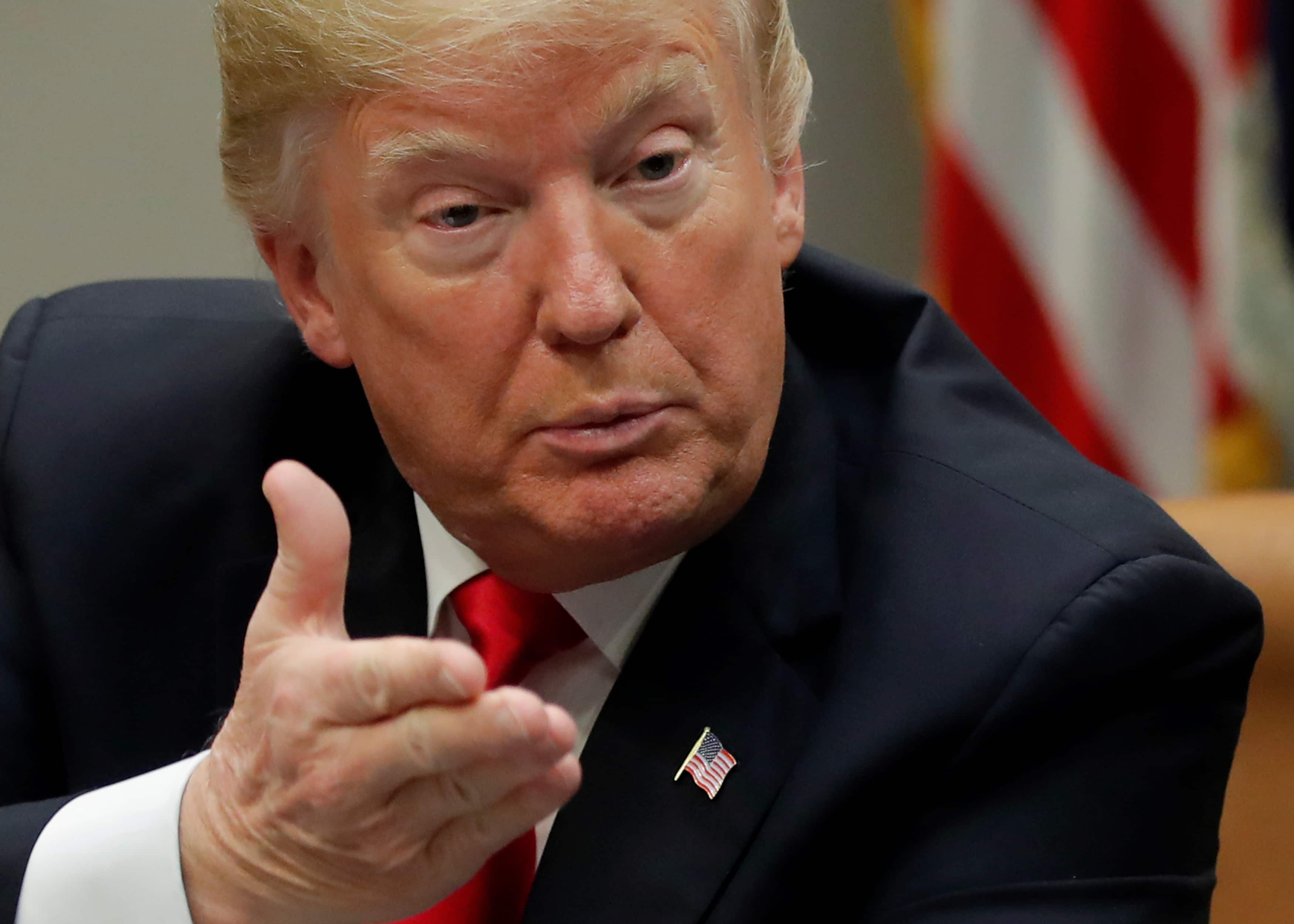 President Donald Trump defends personal charity accused of illegal activities