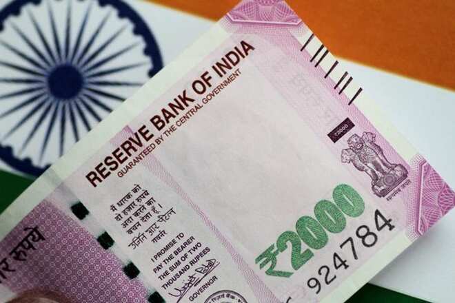 Rupee's tumultuous year ends with 9 pc annual loss at 69.77 a dollar