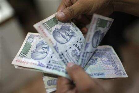 Rupee slips by 26 paise against US dollar on soaring crude oil prices