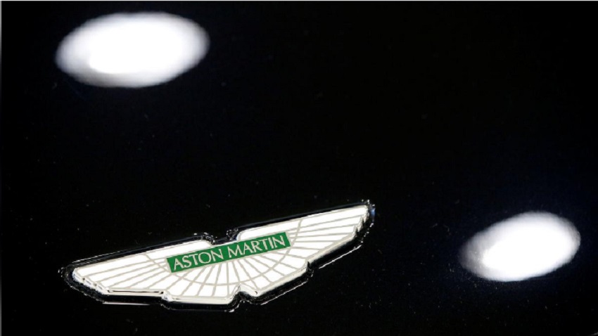 Luxury British carmaker Aston Martin's adjusted pre-tax profit falls
