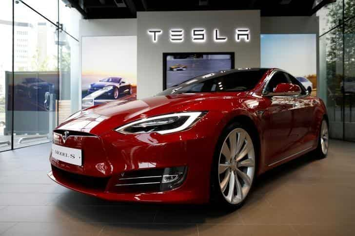 Tesla's high-end Models S, X get big price cuts. | Zee Business