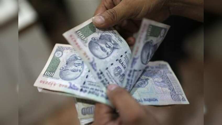 Rupee slips 37 paise to 69.60 vs USD in early trade