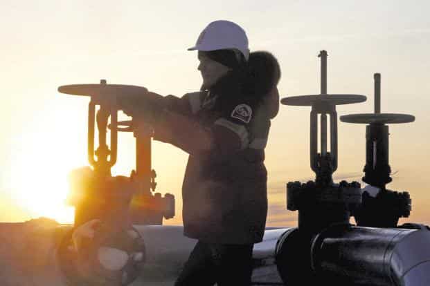 Oil prices bounce up on Iran concern after touching one-month low on trade tensions