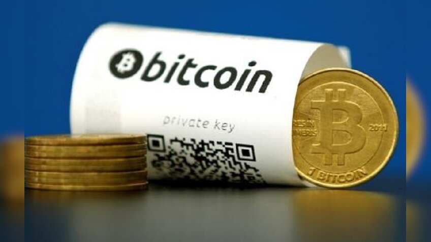 Bitcoin holds above $7,000 after hitting 9-month high