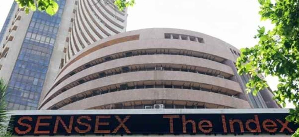 Sensex, Nifty dip on escalating trade war tension; SAIL, Adani Enterprises, Balrampur Chini stocks gain