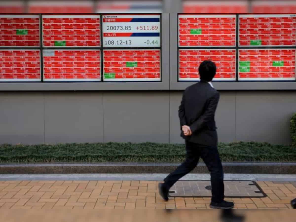Global Markets: Asian shares scale on Fed rate