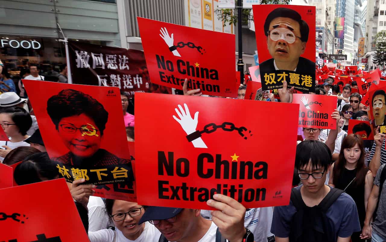 Strike grips Hong Kong as leader warns protests to challenge Chinese sovereignty