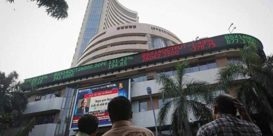 Sensex, Nifty slip on weak global cues; RCom,