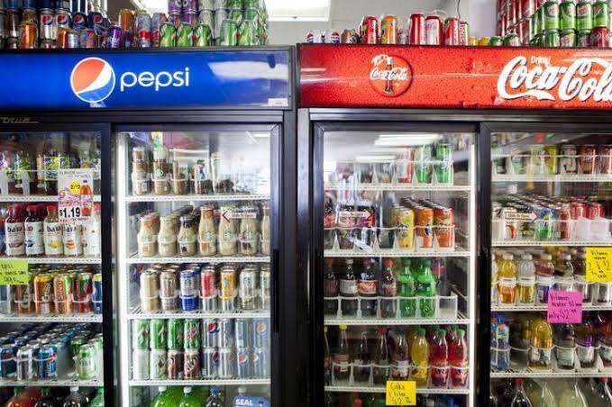 Drinking soft drinks linked to obesity, tooth wear