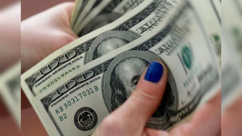 US dollar rises as risk appetite improves