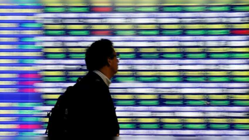 Global Markets: Asian shares slide on trade disappointment, HK unrest