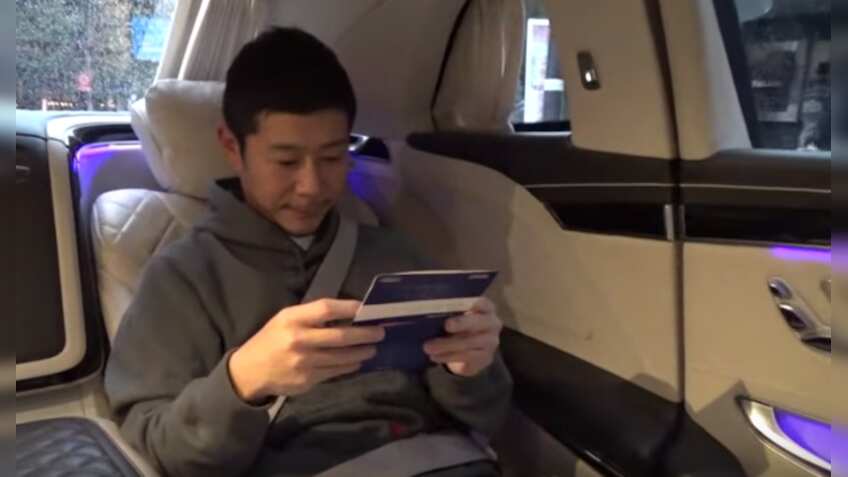 Japanese fashion tycoon Maezawa shows off $900 million SoftBank payday