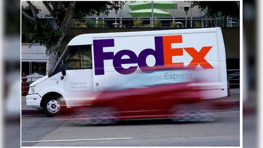 FedEx cuts 2020 profit forecast again as 7-day delivery costs weigh
