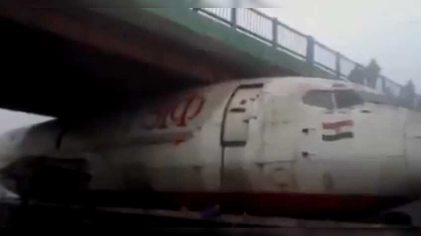Airplane carried on truck gets stuck under Bengal bridge