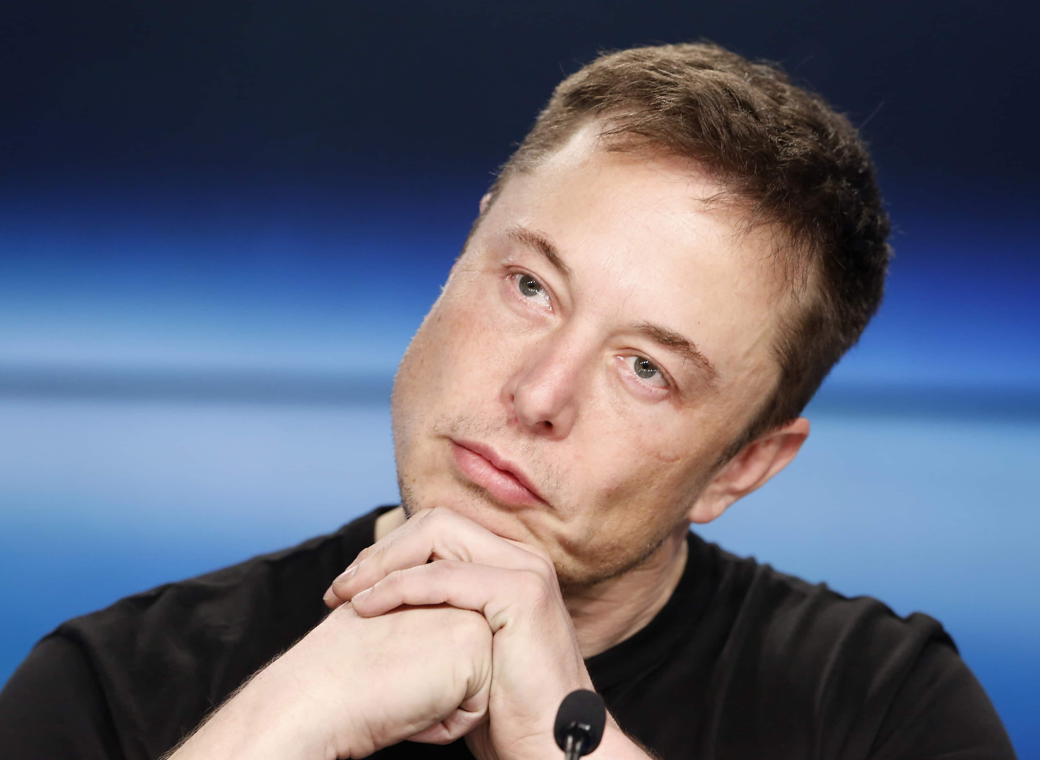 Elon Musk takes a dig at WhatsApp with 'free phone hack' emoji | Zee Business