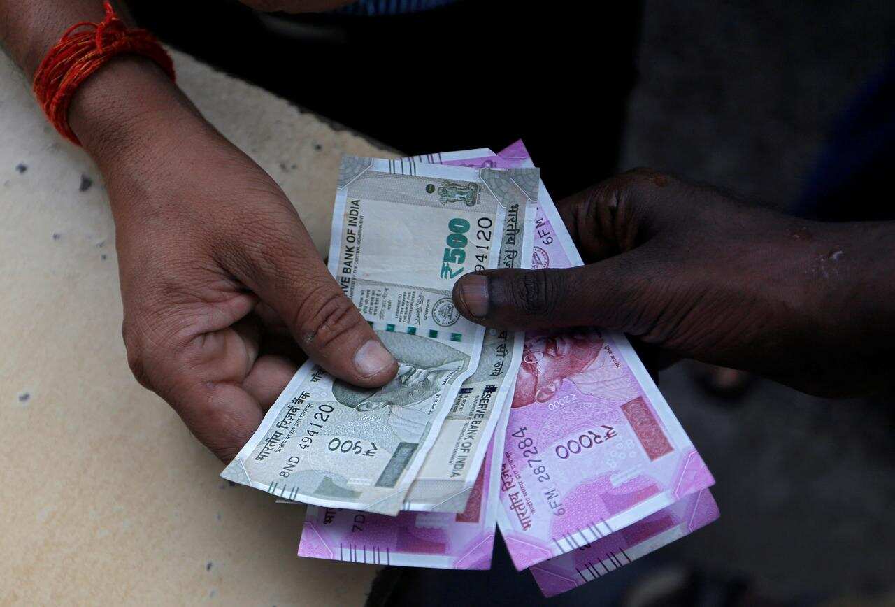 Rupee vs dollar INR tanks 95 paise, falls below 76 level against US