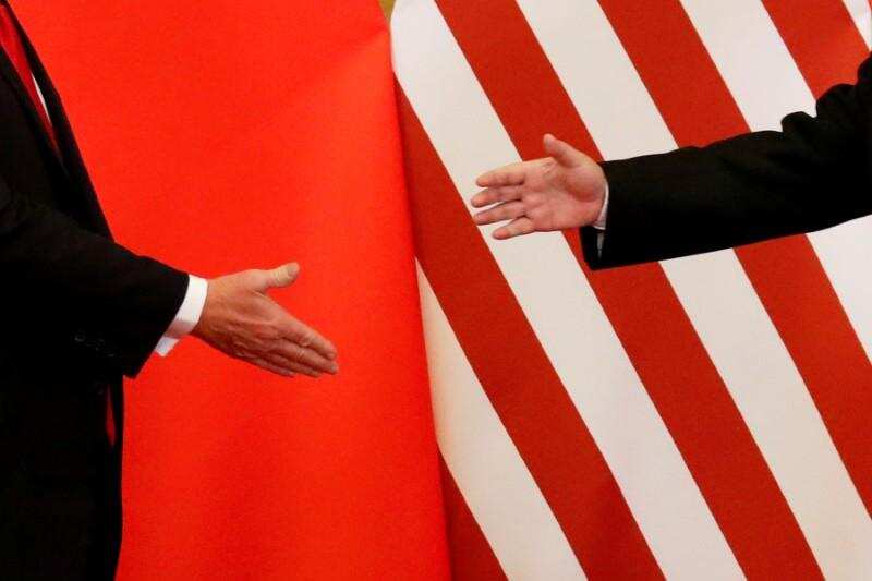 Donald Trump 'torn' over US-China trade deal as officials push to fulfill its terms