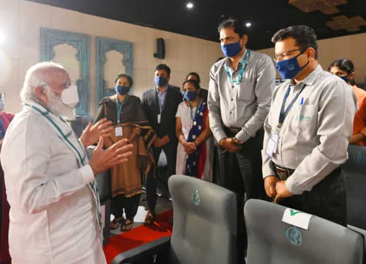 PM Modi arrives Zydus Cadila's plant to review COVID-19 vaccine development  - The Economic Times Video