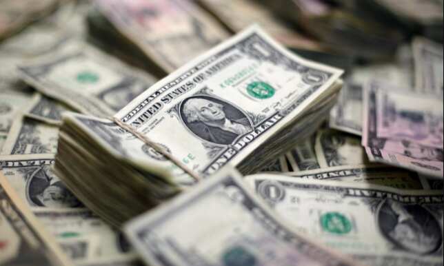 Dollar lifts gold amid worries over U.S. stimulus delay