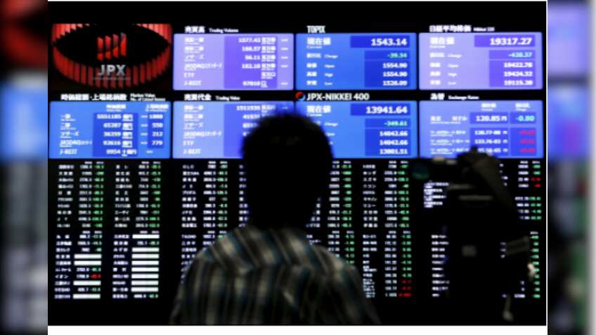 Asian stocks mixed as markets await U.S. runoff results