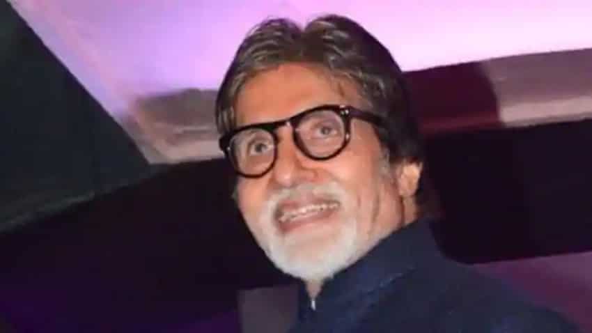 Amitabh Bachchan looks dapper in black, pens lines from father Harivansh Rai Bachchan''s ''Madhushala''