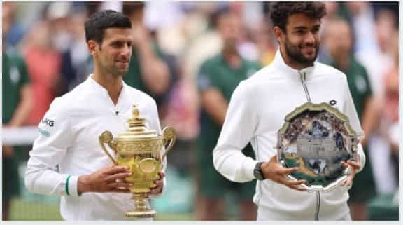 Novak Djokovic battles Matteo Berrettini and history to claim 20th Grand  Slam title | Zee Business