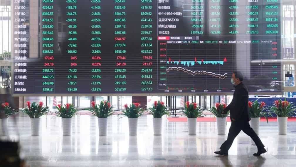 Asian shares mixed as investors digest US inflation surge