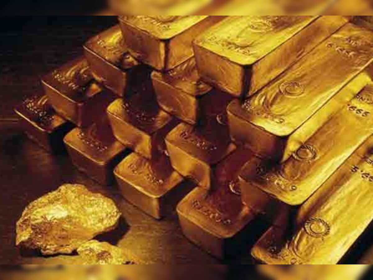 Gold pauses post US Fed decision; higher interest